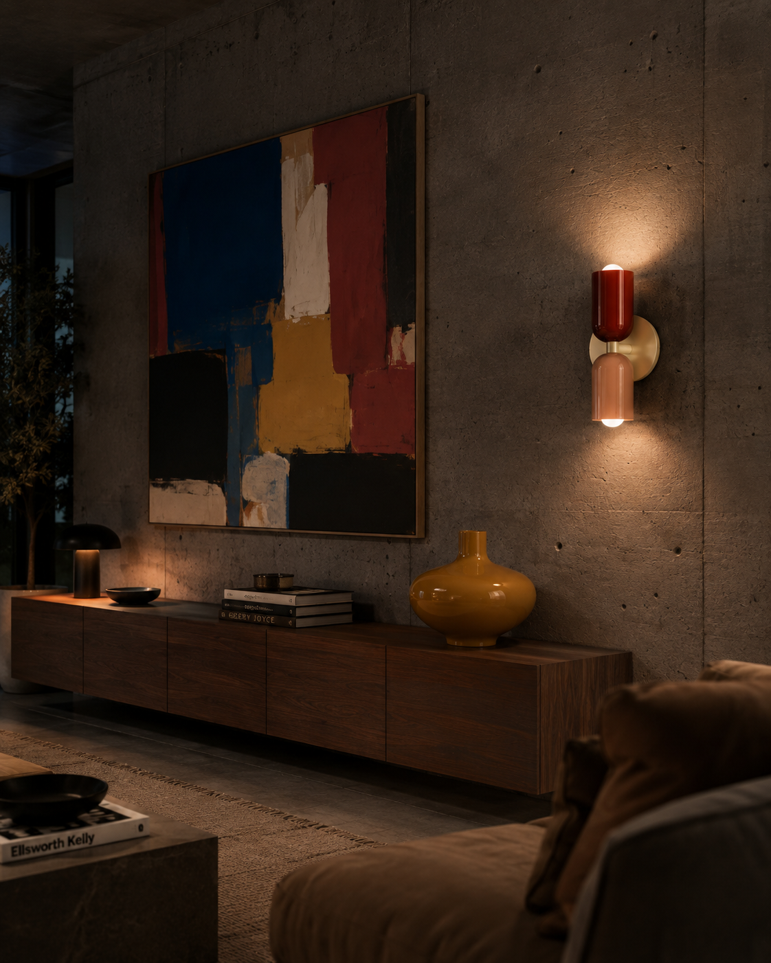 Wall lights - travertine half-moon wall sconce glowing on a dark wall