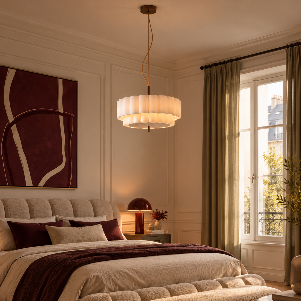 Two-tier pleated fabric chandelier in a cream bedroom