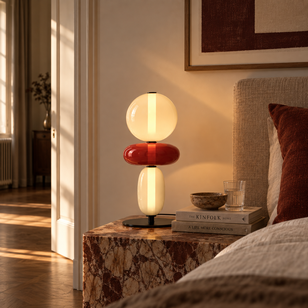 Stacked glass totem table lamp in a living room